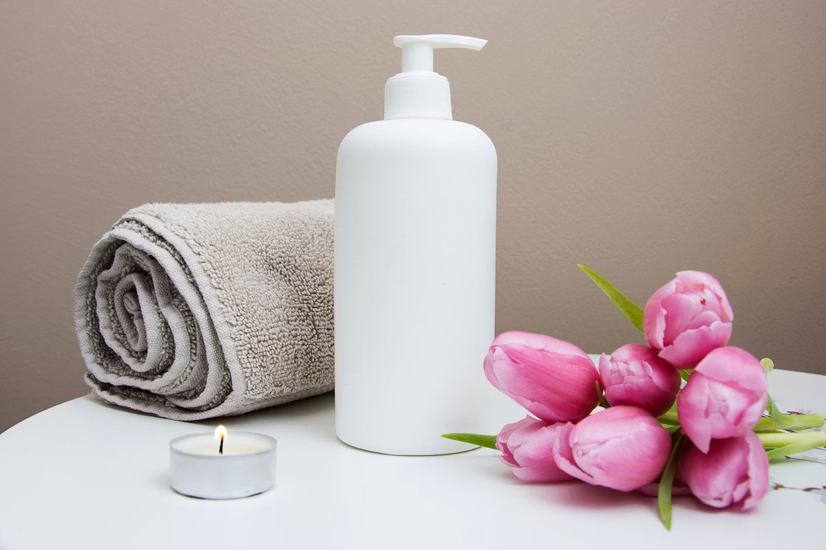 Spa still life with towel, candle and tulips